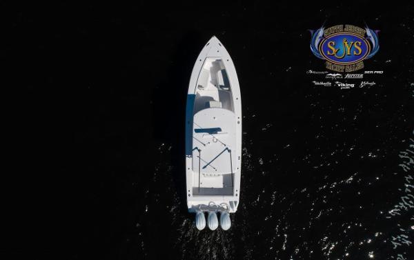 Slide: The Image of Aerial view of 2024 Jupiter 34 boat on dark water. - 32