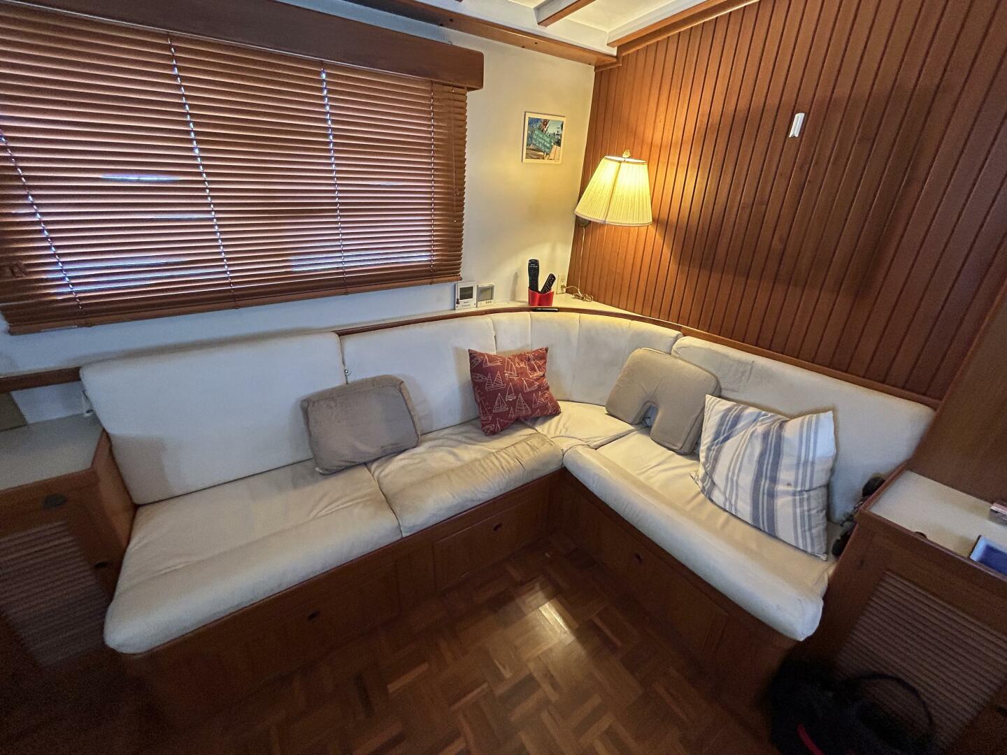 Slide: The Image of 48' Kadey-Krogen salon port seating - 31