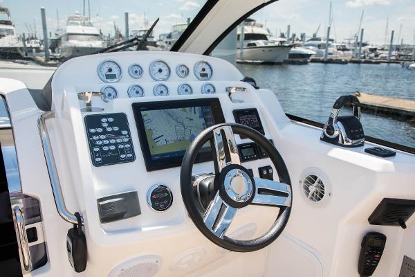 Slide: The Image of Keizer 42 yacht helm with navigation system and controls, docked at marina, 2025 model. - 15