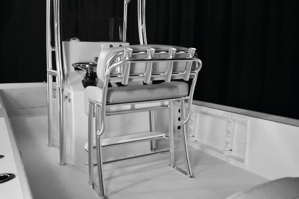 Slide: The Image of 2025 KenCraft 2460 Bay Rider Skiff center console and seating area. - 8