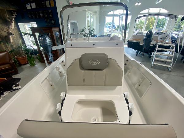Slide: The Image of 2024 Key West 1720 CC boat interior with seating and storage. - 11
