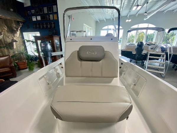 Slide: The Image of 2024 Key West 1720 CC center console boat interior with cushioned seating. - 13