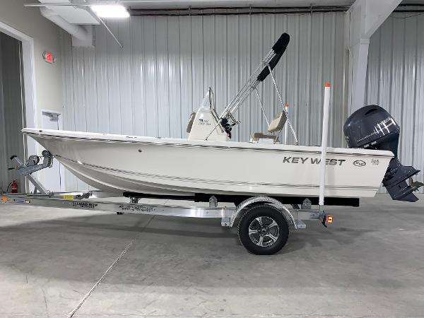 The Image of 2024 Key West 188 Bay Reef boat on trailer in indoor storage. - 0