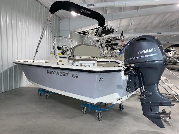 The Image of 2024 Key West 188 Bay Reef boat with Yamaha outboard motor in showroom. - 0