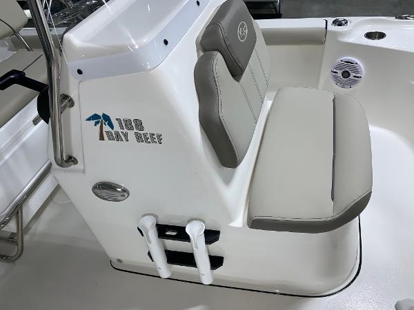 Slide: The Image of 2024 Key West 188 Bay Reef boat interior with cushioned seating. - 10