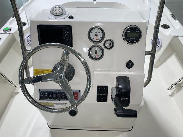 Slide: The Image of 2024 Key West 188 Bay Reef boat console with steering wheel and gauges. - 11