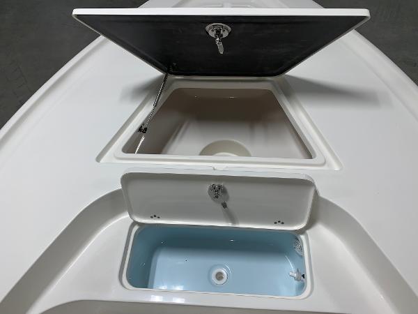 Slide: The Image of 2024 Key West 188 Bay Reef boat storage compartments and livewell. - 11