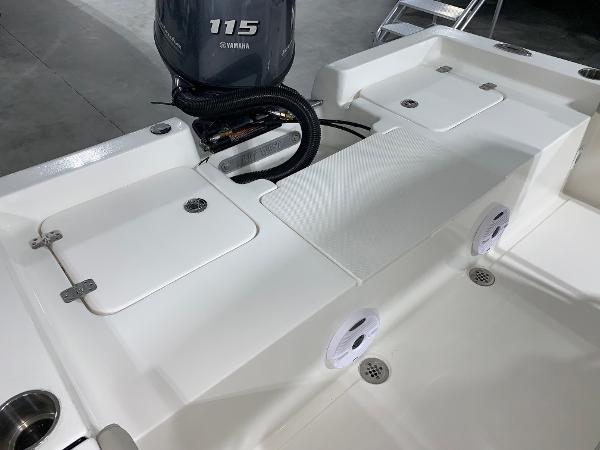 Slide: The Image of 2024 Key West 188 Bay Reef boat with Yamaha 115 engine, rear deck view. - 5
