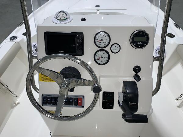 Slide: The Image of 2024 Key West 188 Bay Reef boat console with steering wheel and gauges. - 7