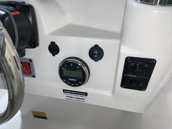 Slide: The Image of Control panel of 2024 Key West 203 DFS boat featuring Clarion and Yamaha components. - 9