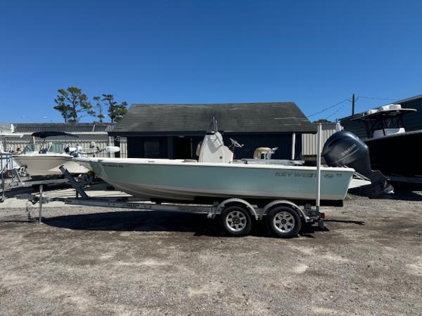 The Image of 2017 Key West 210 Bay Reef boat on trailer, parked outdoors. - 1