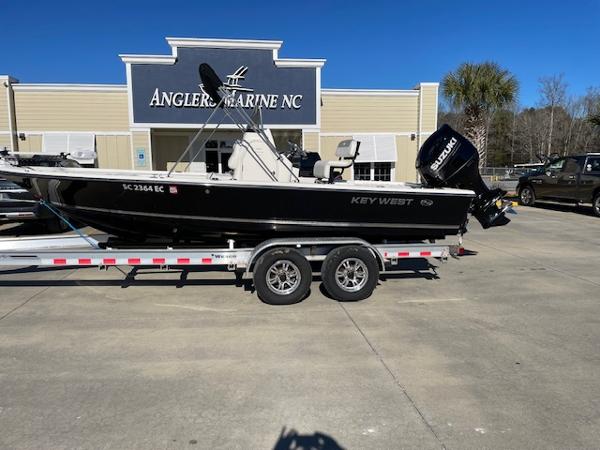 Slide: The Image of 2023 Key West 210 Bay Reef boat on trailer at Anglers Marine NC. - 0