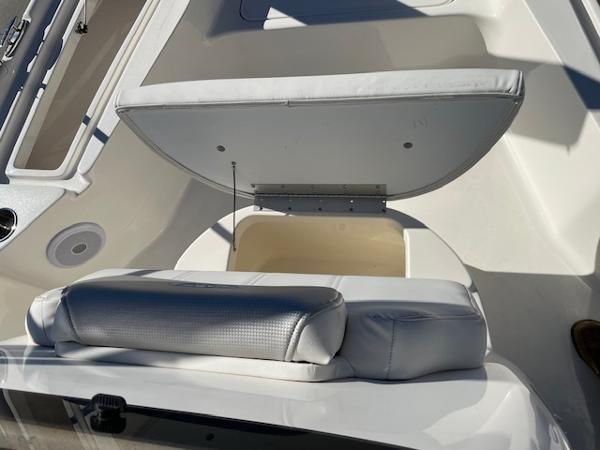 Slide: The Image of 2023 Key West 210 Bay Reef boat with open storage compartment. - 13