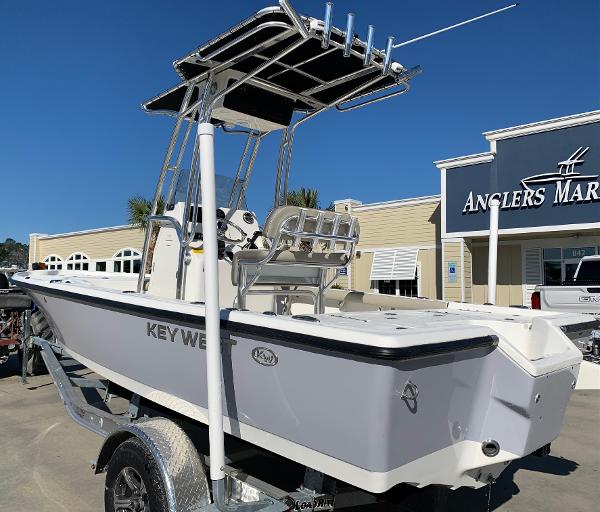 Slide: The Image of 2024 Key West 210 Bay Reef boat on trailer at Anglers Marine dealership. - 1