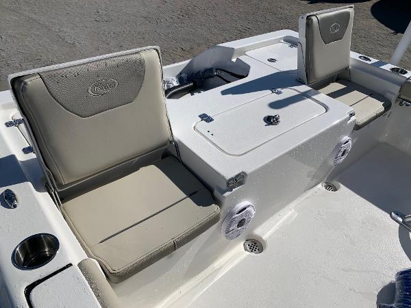 Slide: The Image of 2024 Key West 210 Bay Reef boat interior seating and storage compartments. - 10