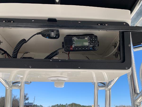 Slide: The Image of 2024 Key West 210 Bay Reef boat console with marine radio and electronics. - 8