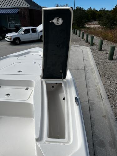 Slide: The Image of 2025 Key West 210 Bay Reef boat with open storage compartment. - 21