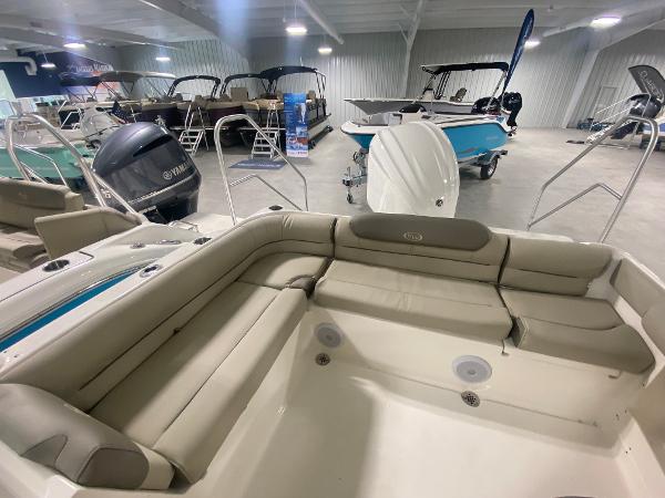 Slide: The Image of 2024 Key West 239 DFS boat interior with seating in showroom. - 7