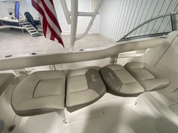 Slide: The Image of 2024 Key West 239 DFS boat interior seating with American flag. - 9