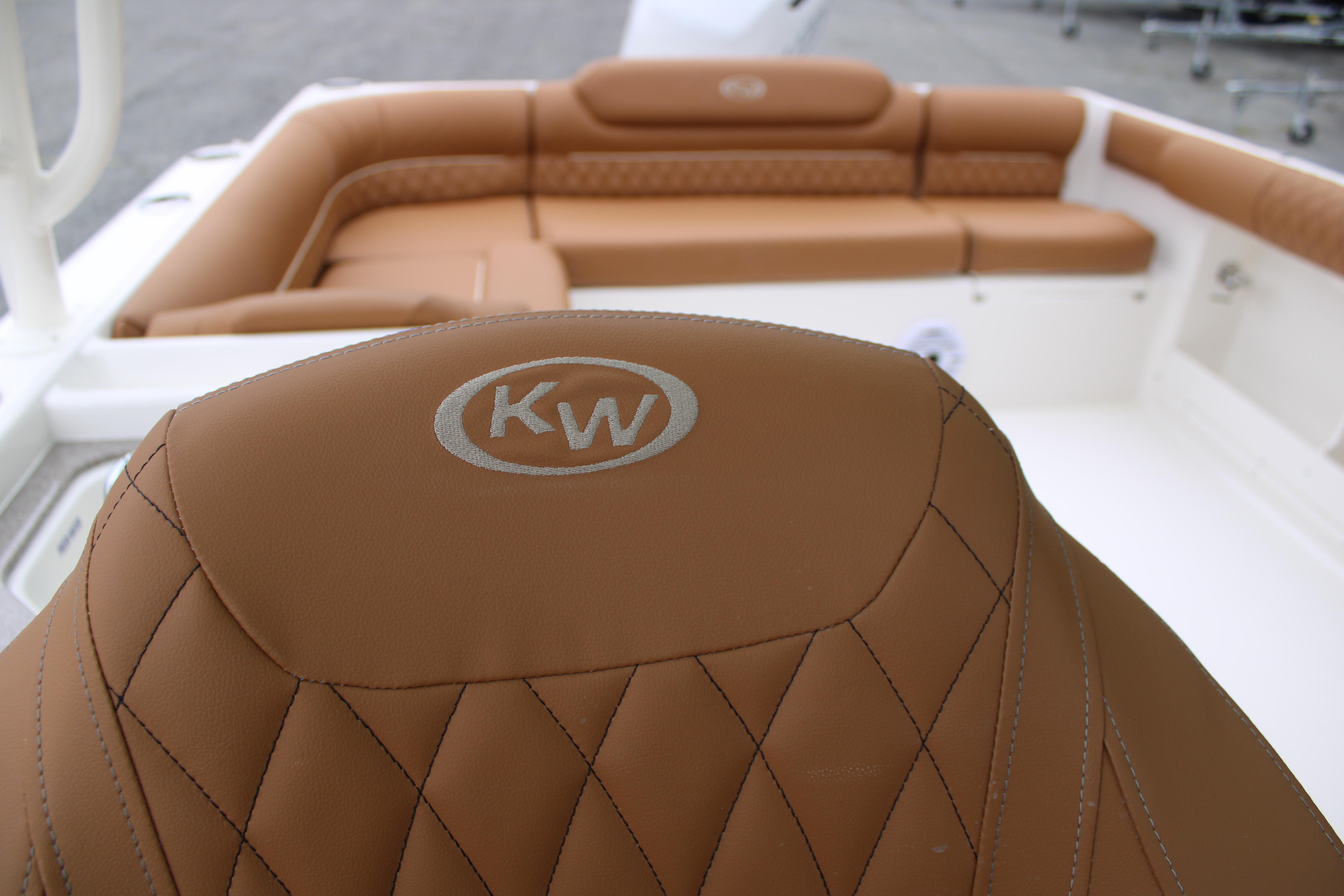 Slide: The Image of Luxurious interior of 2026 Key West 239 DFS boat with tan leather seating. - 13