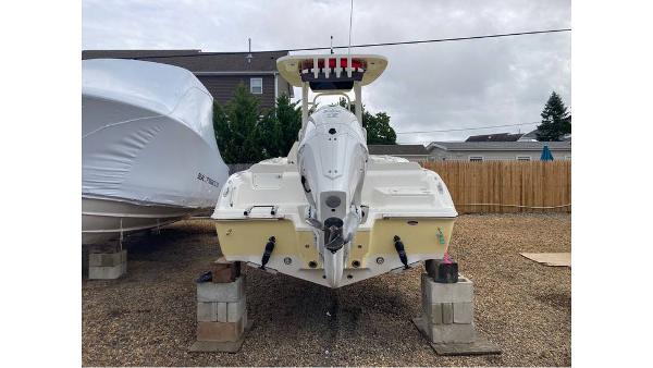 Slide: The Image of 2023 Key West 239 FS boat on blocks in a gravel yard. - 7