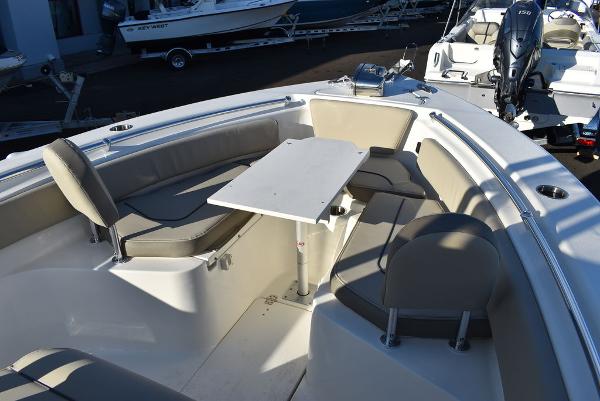 Slide: The Image of 2024 Key West 239 FS boat interior with seating and table. - 11