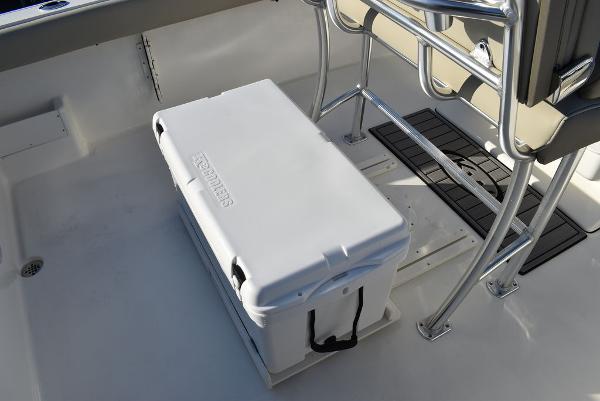 Slide: The Image of 2024 Key West 239 FS boat interior with cooler and seating area. - 12