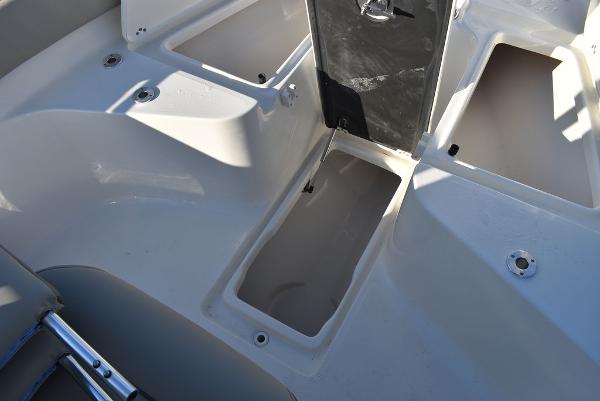 Slide: The Image of 2024 Key West 239 FS boat interior storage compartments. - 21