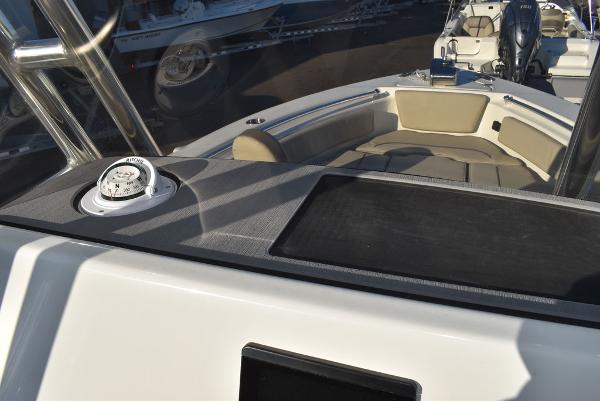 Slide: The Image of 2024 Key West 239 FS boat interior with seating and compass. - 26