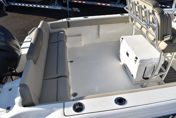 Slide: The Image of 2024 Key West 239 FS boat interior with seating and cooler. - 37