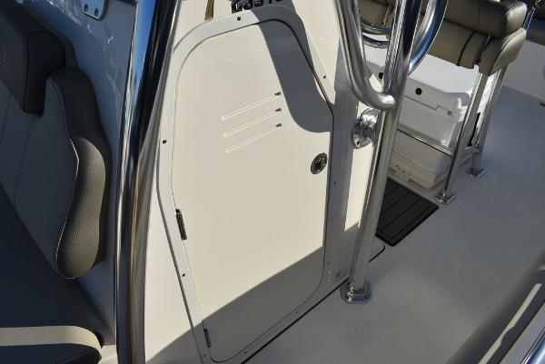 Slide: The Image of 2024 Key West 239 FS boat interior with seating and storage compartment. - 42