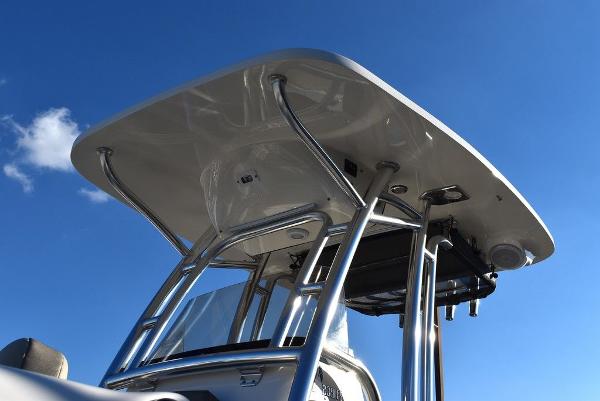 Slide: The Image of 2024 Key West 239 FS boat T-top against clear blue sky. - 47