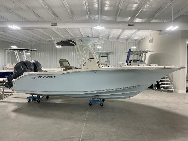 Slide: The Image of 2024 Key West 244 CC center console boat in showroom. - 0