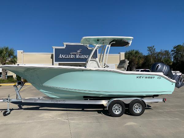 Slide: The Image of 2024 Key West 244 CC boat on trailer at Anglers Marine dealership. - 0