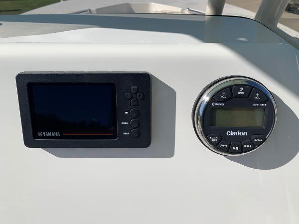 Slide: The Image of Yamaha display and Clarion audio system on 2024 Key West 244 CC boat. - 10