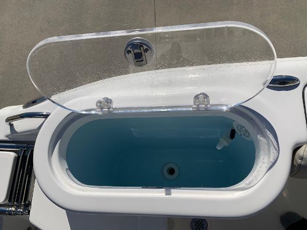 Slide: The Image of 2024 Key West 244 CC livewell with open lid. - 13