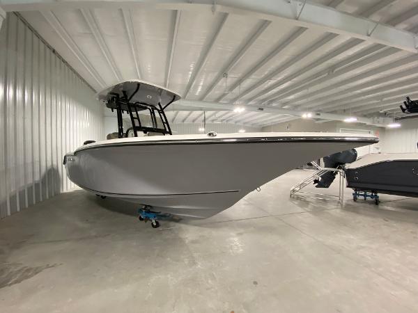 Slide: The Image of 2024 Key West 244 CC boat in indoor storage facility. - 2