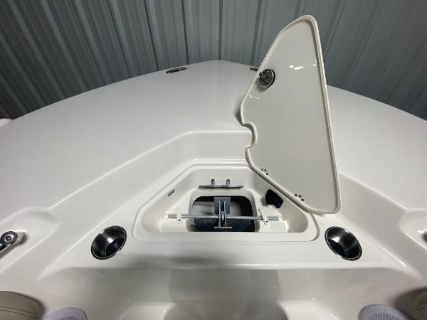 Slide: The Image of 2024 Key West 244 CC boat anchor compartment with open hatch. - 20