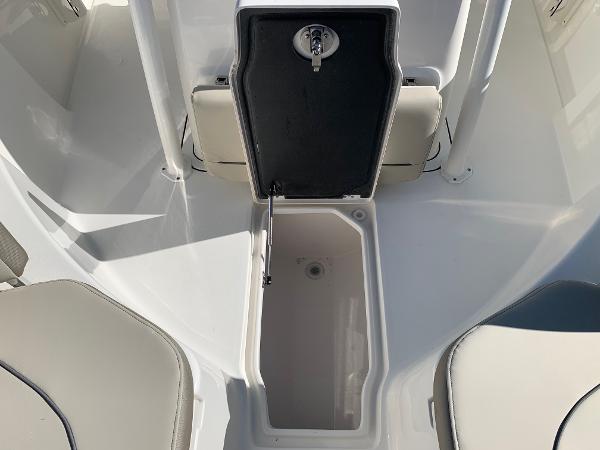 Slide: The Image of 2024 Key West 244 CC boat storage compartment with open hatch. - 22