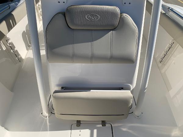 Slide: The Image of 2024 Key West 244 CC boat seating area with cushioned backrest. - 24