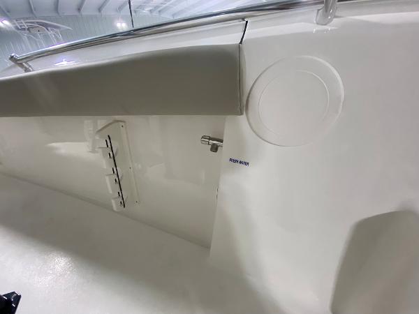 Slide: The Image of 2024 Key West 244 CC boat interior detail with fresh water outlet. - 25