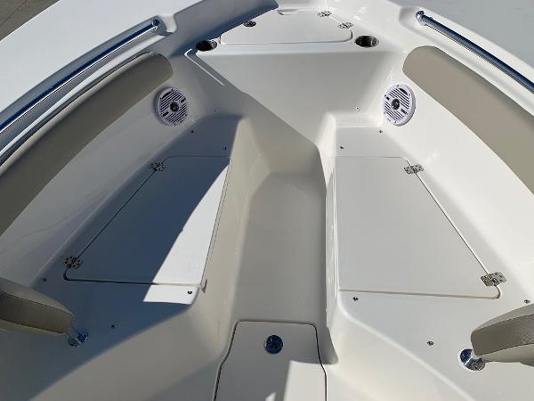 Slide: The Image of 2024 Key West 244 CC boat interior with seating and storage compartments. - 27