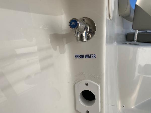 Slide: The Image of Fresh water outlet on 2024 Key West 244 CC boat. - 34