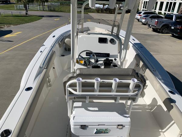 Slide: The Image of 2024 Key West 244 CC center console boat interior with helm and seating. - 4