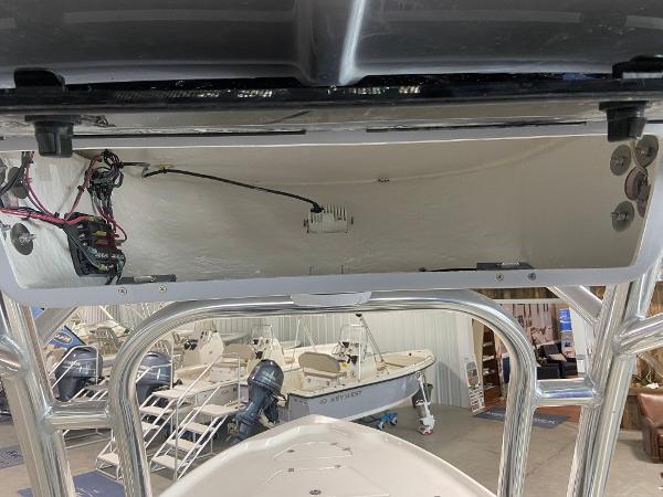Slide: The Image of 2024 Key West 250 Bay Reef boat interior and wiring in showroom. - 15