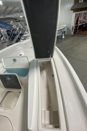 Slide: The Image of 2024 Key West 250 Bay Reef boat storage compartments and interior view. - 18
