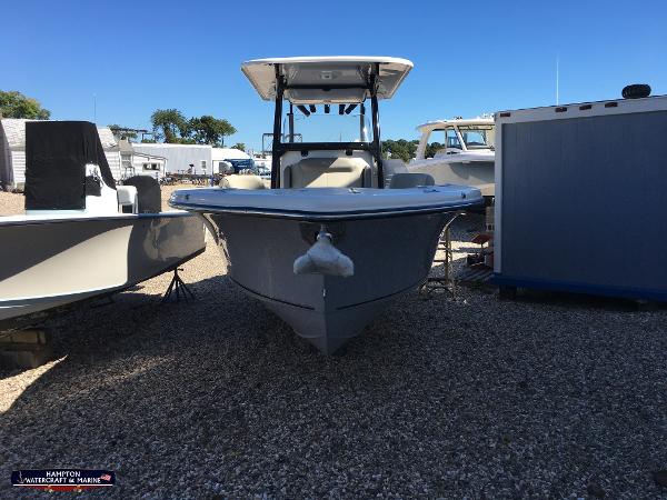 Slide: The Image of 2023 Key West 263 FS boat on display at a marina. - 22