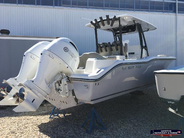 Slide: The Image of 2023 Key West 263 FS boat with dual outboard engines on display. - 4