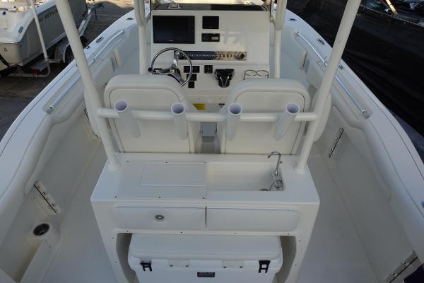 Slide: The Image of 2024 Key West 263 FS boat interior with helm station and sink. - 12