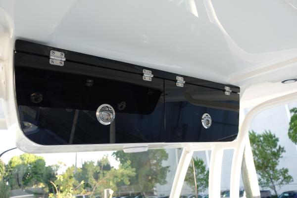 Slide: The Image of 2024 Key West 263 FS boat overhead storage compartments. - 17